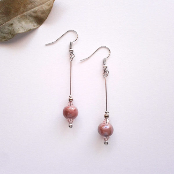 Boucles d'oreilles nébuleuse, en céramique rose.